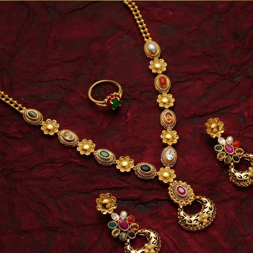 Floral link necklace with multi-coloured stones, matching chandbali earrings and a ring