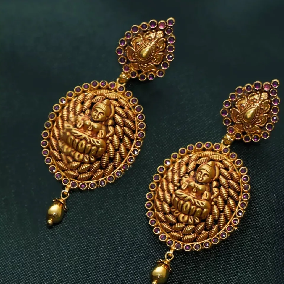 Antique-finish drop earrings with Lakshmi coin motifs